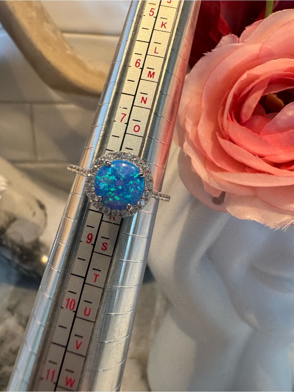 Silver Halo Ring with Blue-Green Opal Center